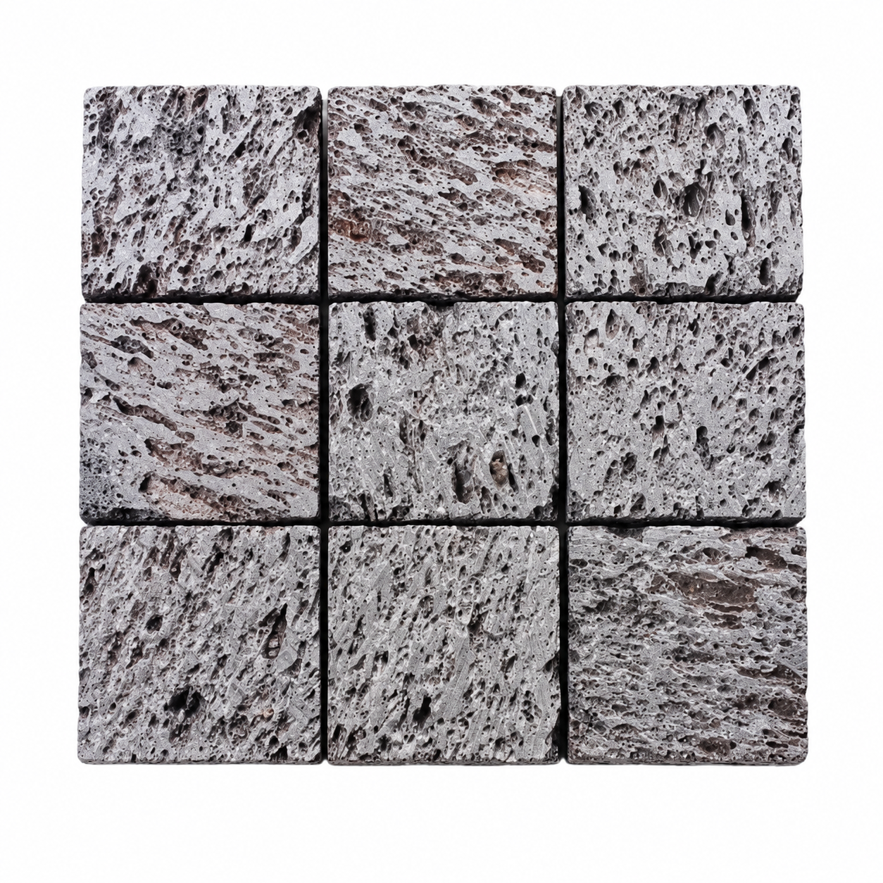 Grey volcanic cobblestones arranged in a straight three-by-three grid on white