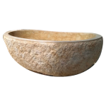 Beige marble bathtub with textured exterior, side view