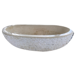 Cream marble bathtub with textured exterior, enlarged full side view