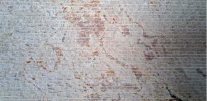 Original Crema Pasific marble wall cladding with a linear craft finish