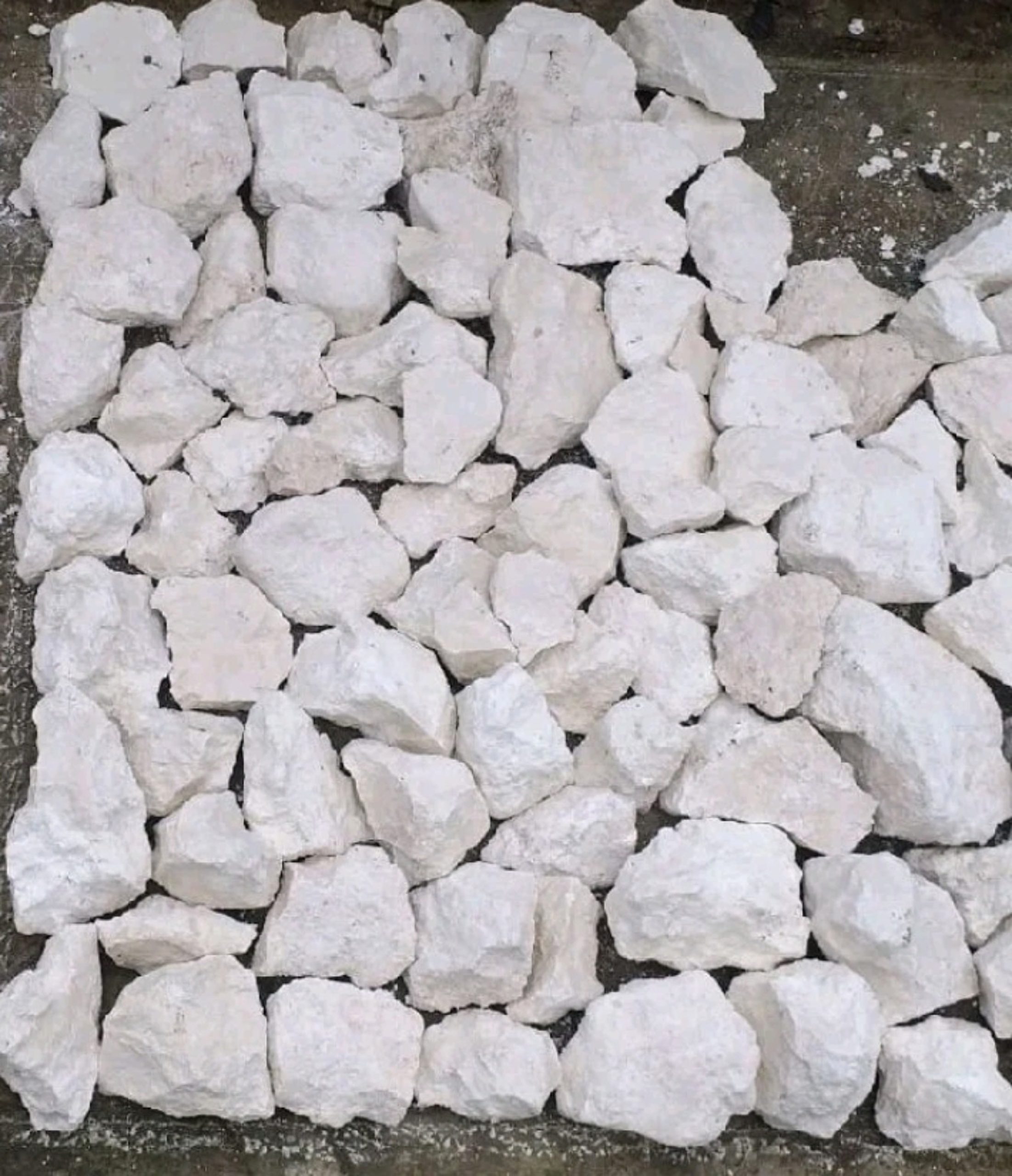 Original irregular white limestone cladding pieces with natural textured surfaces